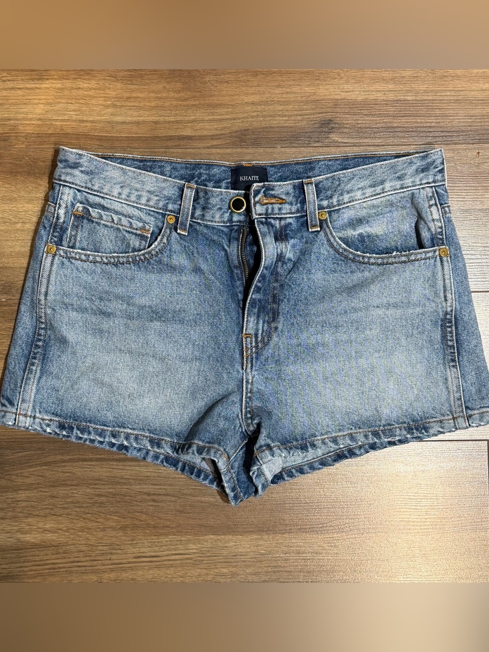 KHAITE Medium Wash Blue Denim Cutoff Shorts - Women